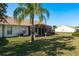 Spacious backyard with a screened patio at 1116 Flora Vista St, Trinity, FL 34655