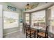 Bright breakfast nook with table and chairs near window at 1116 Flora Vista St, Trinity, FL 34655