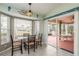 Kitchen nook with table and chairs, overlooking backyard at 1116 Flora Vista St, Trinity, FL 34655