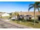 Brick front exterior with two-car garage at 1116 Flora Vista St, Trinity, FL 34655