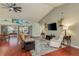 Spacious living area with hardwood floors, recessed lighting, and access to patio at 1116 Flora Vista St, Trinity, FL 34655