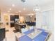 Spacious kitchen with island, stainless steel appliances, and granite countertops at 11714 Sunburst Marble Rd, Riverview, FL 33579
