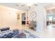Spacious living room with comfortable seating and a stylish bar area at 11714 Sunburst Marble Rd, Riverview, FL 33579