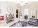 Bright living room featuring a built-in bar and comfortable seating at 11714 Sunburst Marble Rd, Riverview, FL 33579