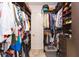 Spacious walk-in closet with custom shelving and hanging space at 11714 Sunburst Marble Rd, Riverview, FL 33579