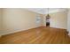 Bright dining room with hardwood floors and chandelier at 1503 River Ct, Tarpon Springs, FL 34689