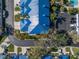 Aerial view showcasing the community building and parking area at 1621 Watermark Ne Cir # 1621, St Petersburg, FL 33702