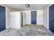 Clean and well-lit building entry with tiled flooring at 1621 Watermark Ne Cir # 1621, St Petersburg, FL 33702
