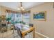Bright dining area with wood table and window seating at 1621 Watermark Ne Cir # 1621, St Petersburg, FL 33702