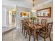 Spacious dining room with hardwood floors and kitchen view at 1621 Watermark Ne Cir # 1621, St Petersburg, FL 33702