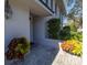 Side entryway with lush landscaping and lighting at 1621 Watermark Ne Cir # 1621, St Petersburg, FL 33702