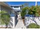 Welcoming entryway with brick walkway and landscaping at 1621 Watermark Ne Cir # 1621, St Petersburg, FL 33702