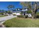 Two-story home with blue roof and double garage at 1621 Watermark Ne Cir # 1621, St Petersburg, FL 33702