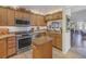 Updated kitchen with stainless steel appliances and granite countertops at 1621 Watermark Ne Cir # 1621, St Petersburg, FL 33702