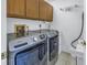Laundry room with Maytag washer and dryer at 1621 Watermark Ne Cir # 1621, St Petersburg, FL 33702