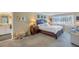 Spacious Primary bedroom with large bed and en-suite bathroom at 1621 Watermark Ne Cir # 1621, St Petersburg, FL 33702
