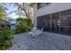 Private patio with seating area and screened enclosure at 1621 Watermark Ne Cir # 1621, St Petersburg, FL 33702