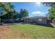 Backyard with patio, fire pit and large yard at 1806 E Shadowlawn Ave, Tampa, FL 33610