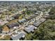 Aerial view of houses and landscape at 1936 Grand Cypress Ln, Sun City Center, FL 33573