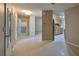 Bright entryway with views into kitchen and bathroom at 1936 Grand Cypress Ln, Sun City Center, FL 33573