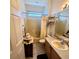 Clean bathroom with shower/tub combo and updated vanity at 20841 Eustis Rd, Land O Lakes, FL 34637