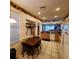 Eat-in kitchen with wood cabinets and a small table at 20841 Eustis Rd, Land O Lakes, FL 34637