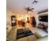 Spacious living room, featuring a large sofa and a Christmas tree at 20841 Eustis Rd, Land O Lakes, FL 34637