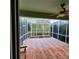 Spacious screened patio with brick pavers, perfect for relaxing outdoors at 20841 Eustis Rd, Land O Lakes, FL 34637
