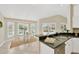 Bright breakfast nook with window seating and view of backyard at 2357 Emerald Lake Dr, Sun City Center, FL 33573