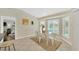 Casual dining area with window seating and view of pool at 2357 Emerald Lake Dr, Sun City Center, FL 33573