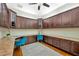 Spacious home office with L-shaped desk and ample storage at 2357 Emerald Lake Dr, Sun City Center, FL 33573