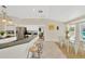 Spacious kitchen with island, stainless steel appliances, and breakfast nook at 2357 Emerald Lake Dr, Sun City Center, FL 33573