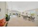 Spacious living area with open floor plan and access to pool area at 2357 Emerald Lake Dr, Sun City Center, FL 33573