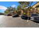 View of the condo's parking lot with several cars parked at 2400 Feather Sound Dr # 1215, Clearwater, FL 33762