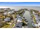 Aerial view of upscale waterfront community with many homes and boats at 2502 S Dundee St, Tampa, FL 33629