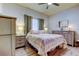 Cozy bedroom with a comfortable bed and plenty of closet space at 3000 Red Oak Court # 103, Palm Harbor, FL 34684