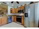 Modern kitchen with stainless steel appliances at 3000 Red Oak Court # 103, Palm Harbor, FL 34684