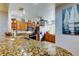 Well-equipped kitchen with granite counters at 3000 Red Oak Court # 103, Palm Harbor, FL 34684