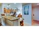 Kitchen with granite countertops and wood cabinets at 3000 Red Oak Court # 103, Palm Harbor, FL 34684