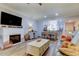 Spacious living room featuring hardwood floors and an open floor plan at 3000 Red Oak Court # 103, Palm Harbor, FL 34684