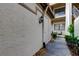 Private side entrance with storage and walkway at 3000 Red Oak Court # 103, Palm Harbor, FL 34684