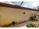 Private exterior storage with pathway and landscaping at 3000 Red Oak Court # 103, Palm Harbor, FL 34684