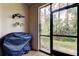 Covered storage area with space for a grill and outdoor equipment at 3000 Red Oak Court # 103, Palm Harbor, FL 34684