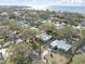 Aerial view of a single-Gathering home with a waterfront lot at 3613 S Gardenia Ave, Tampa, FL 33629
