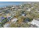 Aerial view of a single-Gathering home on a tree-lined street at 3613 S Gardenia Ave, Tampa, FL 33629