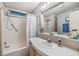 Bathroom with shower/tub combo and updated vanity at 36901 Kimela Ave, Zephyrhills, FL 33542
