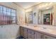 Bathroom with dual sinks and ample storage at 36901 Kimela Ave, Zephyrhills, FL 33542