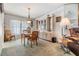 Bright dining area with wood table and hutch at 36901 Kimela Ave, Zephyrhills, FL 33542