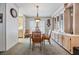 Dining room with built-in hutch and wood table set at 36901 Kimela Ave, Zephyrhills, FL 33542