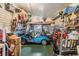 Spacious garage with golf cart and ample storage at 36901 Kimela Ave, Zephyrhills, FL 33542